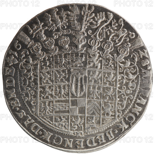Thaler, coats of arms, male bust in armour, George William Hohenzollern (Elector of Brandenburg; Duke of Prussia; 1620–1640) — iconography. Obverse: torso facing right in collar and decorative armour girded with a sash, sceptre in right hand, helmet with raised visor and plume in left hand. In the rim, between the borders, an inscription beginning with a rosette GEORG:WILH:D:G:M, RCHI:BRAN:SAC:ROM:IMP:ARCHIC:EL:D.PRVS:. Reverse: a twenty-four-field coat of arms with ornaments, topped with seven jewels. The date numerals 16 · 28 are separated by jewels. On the half-rim between the rims, an inscription beginning with a rosette and ending with a heart, ANCK.BEDENCK.DAS.ENDE. 1628. Ducal Prussia (1525–1701), Königsberg. Coin: diameter 43.1 mm, weight 29.04 g, axis 45°.