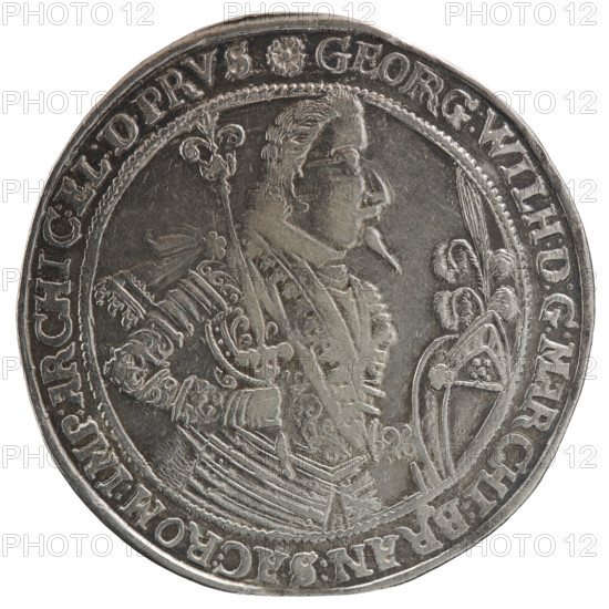 Thaler depicting male bust in armor: George William of Hohenzollern (Elector of Brandenburg; Duke of Prussia; 1620–1640) — Obverse: torso facing right in collar and decorative armor, girded with a sash, sceptre in right hand, helmet with raised visor and plume in left hand; rim inscription beginning with a rosette GEORG:WILH:D:G:MARCHI:BRAN:SAC:ROM:IMP:ARCHIC:EL:D.PRVS. Reverse: twenty-four-field coat of arms with ornaments topped with seven jewels; date digits 16 -34 separated by jewels; half-rim inscription ending with a heart +ANFANCK.BEDE, CK.DAS.ENDE, 1634. Ducal Prussia (1525–1701), Königsberg. Coin: diameter 44.7 mm, weight 28.26 g, axis 60°.