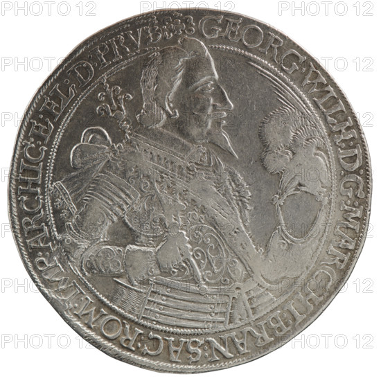 Thaler by Koch, Dawid, Ernest Pfahler (publisher). Obverse: male bust/torso facing right in a collar and decorative armour girded with a sash, holding a sceptre in his right hand and a helmet with raised visor and plume in his left; the figure's head divides the inner border. Rim inscription beginning with a cross with plant motifs: GEO, GW, H:D:G:MARCHI:BRAN:SAC:ROM:IMP:ARCHIC:E:EL:D:PRVS. Reverse: under a ducal mitre separating the numerals 16 - 36, a nine-field coat of arms with ornaments; on both sides of the shield letters D - K; rim inscription divided by the mitre and ending with a heart: AN, NG.BEDENCK.DAS.END. Date: 1636. Subject: George William Hohenzollern (Elector of Brandenburg; Duke of Prussia; 1620–1640) — iconography. Place/date: Ducal Prussia, Königsberg. Object type/material: coin (thaler), diameter 44.5 mm, weight 28.46 g, axis 180°.