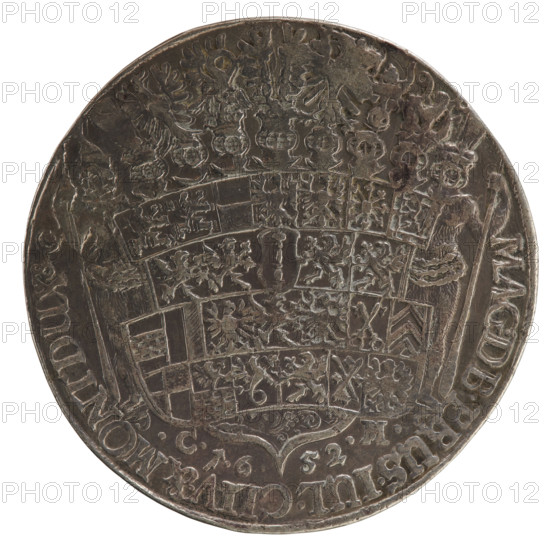 Thaler: Obverse half-figure in decorative armour girded with a sash, sceptre in right hand, helmet with raised visor and plume in left hand. In the rim, between the borders, inscription '+FRID:WILH:D:G:MARCHI:BRAN:SAC:ROM:IMP:ARCHIC.&.ELECT.' Reverse: 26-field coat of arms shield topped with seven jewels supported by wild men; below, separated by the shield, letters and numbers of the date '.C.1.6.-52.M.' Lower half-rim inscription 'MAGDB.PRUS.IUL.CLIV.&MONT.DUX&C', dated 1652. Depicts Frederick William I Hohenzollern (Great Elector of Brandenburg; Duke of Prussia; 1620–1688). Ducal Prussia (1525–1701), Königsberg. Coin (thaler): diameter 45.8 mm, weight 28.25 g, axis 90°.