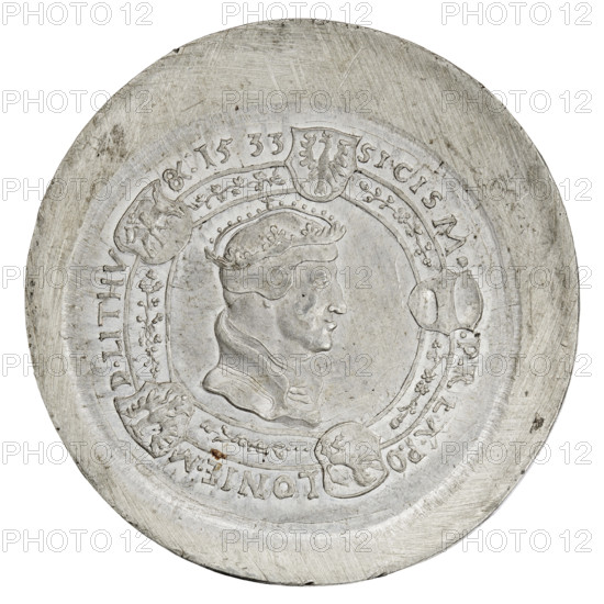Crown thaler medal forgery by Majnert; Sigismund I the Old (King of Poland; 1506–1548); Majnert, Józef (1813–1879); Potocki, Andrzej (1861–1908). Obverse: Bust of Sigismund I in a cap and crown. In the rim five shields with the coats of arms of Poland, Lithuania, Royal Prussia, Red Ruthenia and Austria. In the rim an inscription divided by coats of arms: SIGISM P REX PO LONIE MD LITHV 1533. Reverse: Bust of Sigismund Augustus in a cap and crown. On the sides the date 1533. On the rim the coats of arms of Poland, Lithuania, Royal Prussia, Red Ruthenia and Bona Sforza with inscription: SIG AVG SECUND FILIVS REX PO LON. Medium: coin; diameter 55.6 mm; weight 51.50 g., A round metallic object with a raised circular central area containing a profile portrait of a person wearing a crown and a high collar, surrounded by a decorative ring featuring a group of small floral motifs and several shield-like shapes with embossed designs; the metal surface shows scratches and wear with a silvery gray...