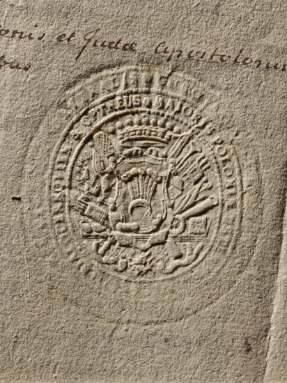 Seal of Jerzy Wandalin Mniszek, Starost of Kcyn, Jerzy August Wandalin (1715–1778). Oval dry impression of the seal, 1768, Poland. On a decorative shield, under a nine-baton crown, the Mniszech coat of arms; behind the shield, rich panoplies; below the shield, on a ribbon, an order. Inscription on a double rim, partially illegible. Seal; dimensions: 57.5 mm and 61.5 mm., A textured beige paper with a circular embossed seal in the center showing a detailed heraldic design including a crown, ornamental fans or plumes, and various decorative shapes; the embossing creates raised and recessed areas casting subtle shadows. There is a small area of dark brown ink handwriting near the top edge and a few tiny brown spots on the paper surface. The visible colors are beige, cream, light brown, and dark brown.