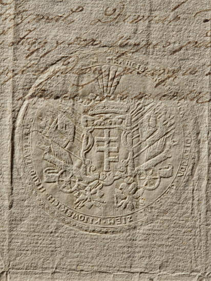 Seal of Franciszek Potocki, Voivode of Vilnius, Starost of Hrubieszów; Pilawa coat of arms; Round dry impression of the seal. In a decorative cartouche the Pilawa coat of arms, behind it rich panoplies, below on ribbons the Order of the White Eagle and another unidentified order. Partially illegible rim inscription: 'FRANCISZEK POTOCKI VOIVODE GENERAL OF THE KIEV LAND COUNTY.' Dated 1770; Poland., A textured, aged paper surface in beige and tan shows an embossed circular seal with ornate heraldic imagery; the seal features a central shield topped by a crown, decorative flourishes around the shield, and radiating elements that resemble banners or plumes, with a few floral or ribbon motifs near the lower portion. Several areas of cursive handwriting in brown ink appear across the paper, mainly near the top and upper sides, and the paper displays creases, wrinkles, and slight discoloration in shades of light brown and cream.