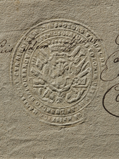 Seal of Jerzy Wandalin Mniszech, Starost of Uj. Oval seal impression in a decorative cartouche with rich panoplies, showing the Mniszech coat of arms and, below it, the Order of the White Eagle. In the rim a partially illegible inscription: GEORG VANDAL DE, MNISZECH, 1777. Poland; seal; dimensions 57.8 mm and 61.3 mm., A close-up of textured paper showing an embossed circular seal with ornate decorative elements and a central crest, surrounded by concentric raised rings and a few semicircular patterns, with some dark ink scribbles partially overlaying the seal; the paper surface has visible fibers and a rough grain. The visible colors are beige and tan for the paper, with dark brown ink marks.
