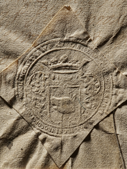 Seal of Stanislaw Denhoff, Starost of Korczyna, Denhoff, Stanislaw Ernest (1673–1728), Zurakowski, Witold (?-1927), coat of arms seals, private seals, seals of starosts, seals attached to documents, Denhoff (coat of arms). Round seal impression of the seal of Stanislaw Denhoff, Hetman of Polish Lithuania, Voivode of Polock, Starost of Korczyna. On a shield crowned with rich labrets, a boar's head facing right — the Denhoff coat of arms. Illegible inscription on the rim. 1717, Poland, seal, The image shows a textured, crumpled sheet of paper in shades of beige and tan with a raised circular embossed seal impression near the center; the seal includes decorative curved lines and a crown-like shape, and the paper has visible fibers, creases, folds, and slight darker brown shadows in areas where it is folded or overlapped.