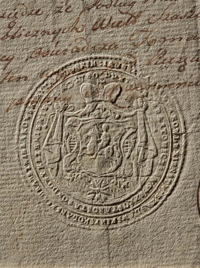 Seal of Janusz Modest Sanguszko, Starost of Krzesno. Round imprint of the seal: on the mantle, under the mitre, a shield with the Pogon coat of arms, below it the Order of the White Eagle. In the double rim, a partially illegible inscription mentioning Janusz, Kowle, Zaslaw and Smolan counties, Kow and Tarnow, Prince .towicz Sanguszko, St. of the Krzemieniec probe. Dated AD 1780. Poland, stamp., A textured beige surface showing an embossed circular seal with decorative raised details including a central shield-like design, ornamental flourishes, and ribbon-like elements; the seal is surrounded by a patterned border and sits over a background of faint cursive handwriting strokes in brown and reddish-brown tones.