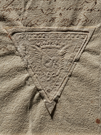 Seal of Jan Cetner, Starost of Lviv (Jan Cetner, ?–1679). Triangular imprint of the seal showing a crowned shield with the Przerow coat of arms; illegible inscription. Document seal, 1676, Poland. Seal dimensions: 1.49 mm × 2.45 mm., The image shows a textured surface in shades of beige and tan with a slightly darker triangular embossed patch placed centrally; the patch and surrounding surface display a rough, wrinkled, fibrous texture with visible creases and irregular indentations, and there are a few subtle brownish spots and darker brown scribble-like marks near the top edge.