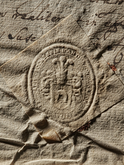 seal of the starost of Opoczno, starost of Opoczno (ca. 1673), coat of arms seals, private seals, document seals, starosts' seals, Lubicz (coat of arms), Oval impression of the seal of the starost of Opoczno. On the shield decorated with labrets, the Lubicz coat of arms, in the crest above the crowned helmet three ostrich feathers. Illegible inscription on the rim: IOAN D, OPOCNENSIS, 1673, Poland, seal, dimension 1 29.3 mm, dimension 2 36 mm, A textured, crinkled sheet of beige paper fills the frame with a raised circular seal pressed into it, showing a detailed emblem in low relief; the paper displays a few folded corners, creases, and layered edges, with darker brown inked handwriting partially visible but not described, and a small area of reddish-brown residue near one fold.