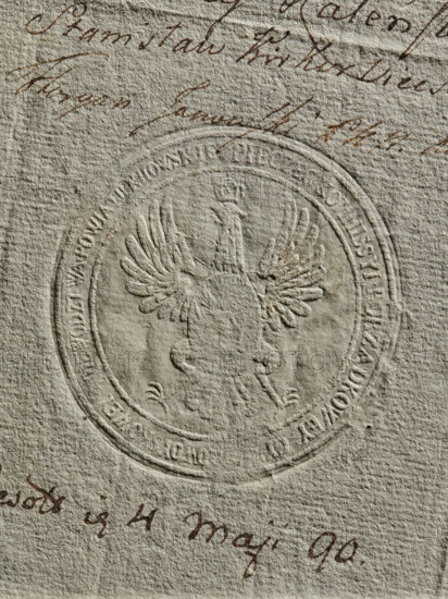 Seal of the Civil-Military Order Commission of the Kiev Voivodeship and Poviat. Civil-Military Order Commission; maker: Zurakowski, Witold (?-1927). Round imprint of the seal of the Civil-Military Order Commission of the Kraków Voivodeship, Lelów County and the Prince's County. Polish eagle with a crown. Inscription around the rim: SEAL OF THE CIVIL-MILTRY ORDER COMMISSION OF THE KIEV COUNTY, 1790. Poland. Seal., A textured off-white paper with a circular embossed seal featuring a stylized eagle with outstretched wings and a crown, surrounded by concentric raised rings; a few areas of brown ink handwriting appear above and below the seal, and there are subtle variations in the paper color with light grayish and tan tones.