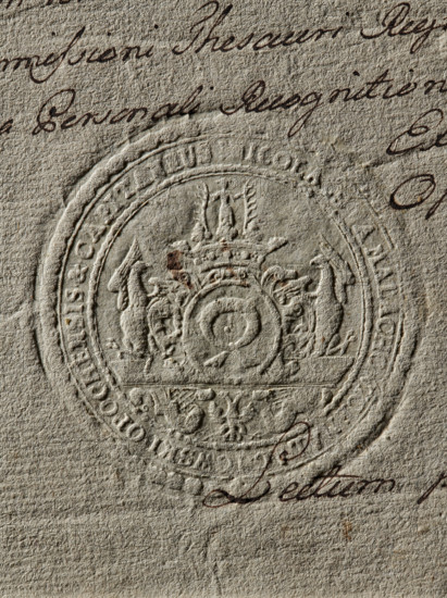 Seal of Mikolaj Malachowski of Malachowice, Starost of Opoczno. Round seal impression. On the decorative console, an oval shield with the Nalecz coat of arms topped by a jewel and noble crown; the shield is supported on both sides by two eagles sitting on the console, and a double-headed eagle appears below. In the rim, inscription: NICOLAUS A. MALACHOWICE MALACHOWSKI OPOCHNESIS & CAPITANEUS, 1776, Poland., A close-up of textured beige paper showing an embossed circular seal with ornate heraldic imagery including a central circular motif, a crown at the top, and animal figures flanking the central area, surrounded by concentric raised rings and decorative flourishes; there is brown ink handwriting partially visible around the seal and small spots of darker brown discoloration on the paper.