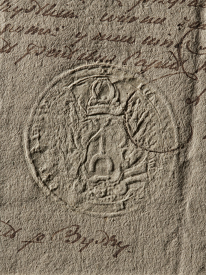 Seal of the Starost of Radziejów, Starost of Radziejów (ca. 1791), Zurakowski, Witold (?-1927), coat of arms seal, private seal, document seal, seal of a starost, Ogonczyk (coat of arms). Round impression of the seal of the Starost of Radziejów. Decorative shield with rich panoplies, with the Ogonczyk coat of arms and a jewel above the rank crown. Illegible inscription on the rim. 1791, Poland., The image shows a textured surface in beige and light brown tones with a circular embossed seal featuring raised patterns and shapes, surrounded by a few areas of darker brown handwritten marks and scribbles; the paper appears wrinkled with many fine creases and fibrous details, and there is a partial oval impression overlapping the circular seal.