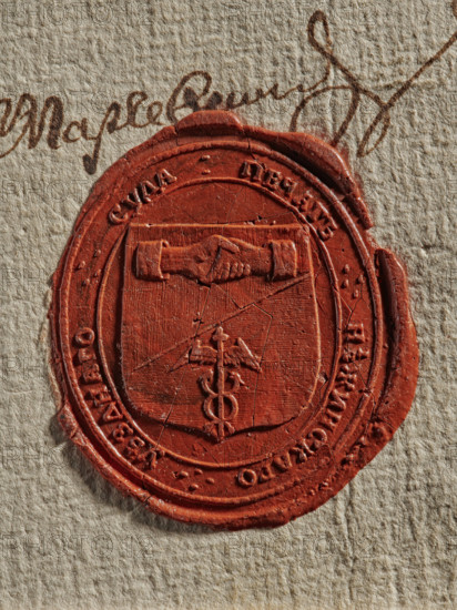 Oval seal of the district court in Niezyn. Coat of arms bipartite, left diagonal: in the upper red field, two clasped hands; in the lower blue field, a caduceus. In the rim, an inscription in Russian. District court seal, documents, official seals, court seals, document seals. Maker/date: Zurakowski, Witold (?-1927) - 1788. Location: Niezyn, Poland. Medium: seal. Dimensions: 34.5 mm and 39.5 mm., A close-up of a circular red wax seal pressed onto textured beige paper, showing a raised central shield shape with a pair of hands at the top of the shield and a vertical staff with wings and entwined serpents below; the seal has an outer ring with decorative raised edges and slight cracks in the wax, and a few darker red variations and small imperfections on its surface, while the paper around it shows a fibrous texture in beige with a few brown ink strokes visible near the top.