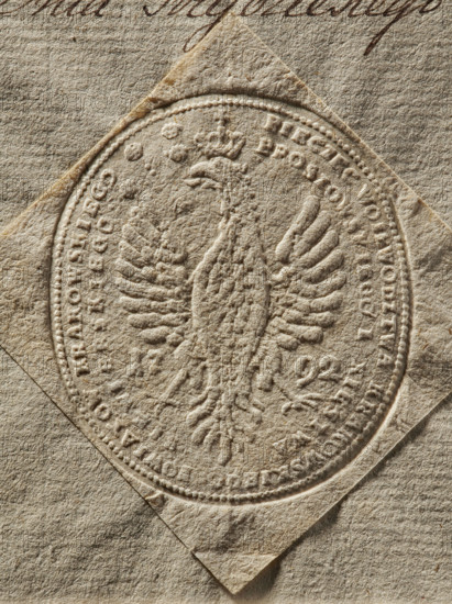 seal of the landed gentry court; documents; official seals; 1792; Kraków, Poland; seal; Zurakowski, Witold (?-1927), A close-up of an embossed circular seal pressed into textured paper, showing a raised double-headed bird with outstretched wings and a crown above its heads, surrounded by a dotted circular border and a ring of raised characters that are not described here; the seal sits on a diamond-oriented piece of paper layered over a larger sheet, with visible paper fibers and creases; colors present include various shades of beige, tan, light brown, and hints of darker brown in the embossing and the paper texture.
