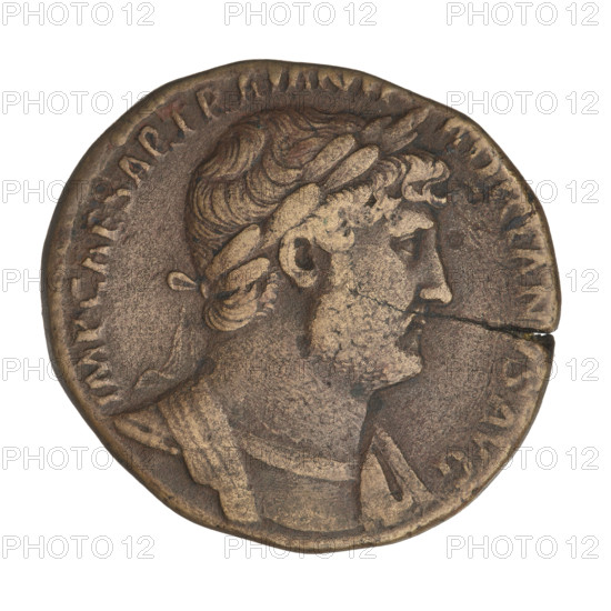 Sestertius, Hadrian (76–138; Roman emperor 117–138). Obverse: bust of Hadrian with laurel wreath facing right; rim inscription: IMPCAESARTRAIANHADRIANVSAVG. Reverse: Virtus standing left, dressed in military dress, wearing a helmet, right foot on a helmet, parazonium in the right hand, spear held vertically in the left hand; rim inscription: PM TR P COS III; on both sides: SC VIRT AVG. Date: 121–122. Place: Rome, Roman Empire (27 BC–476). Coin; weight 23.70 g.