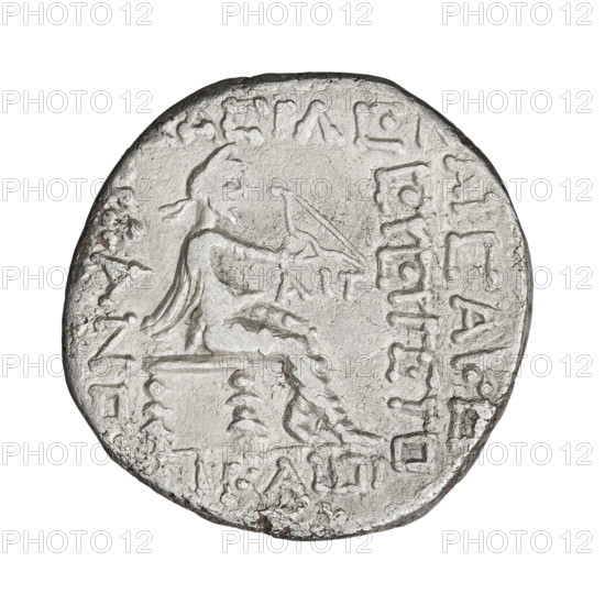 Tetradrachm of Phraates V (2 BC–4 AD), Parthian Kingdom, Iran. Obverse: bust of Phraates V facing left, wearing a diadem and decorative armor. Reverse: Arsakes I seated on a throne facing right, holding a bow; under the arch the letters 'AIT'. Material: coin; diameter 25.0 mm; weight 11.64 g.