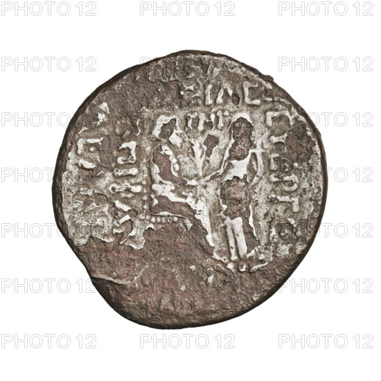 Bronze coin (silver-plated), Vardanes I (41–45 CE). Obverse: bust of Vardanes I facing left, wearing a diadem. Reverse: Vardanes I seated right, accepting a palm from the hands of a goddess (Tyche) standing before him, holding a cornucopia in his left hand. Parthian Kingdom, Iran. Diameter 24.5–25.0 mm; weight 12.60 g.