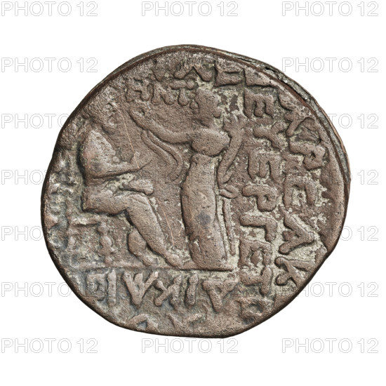 Bronze coin of Gotarzes II (king of the Parthians; reign 40–51 CE). Obverse: bust of Gotarzes II facing left. Reverse: Gotarzes II facing right, seated on a throne; Tyche (personification) standing before him, presenting a diadem in her right hand and holding a cornucopia in her left. Parthian Kingdom, Iran. Weight: 12.45 g.