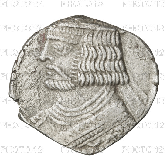Tetradrachm of Vardanes II (55–58). Obverse: bust of Vardanes II left wearing a diadem. Reverse: Vardanes seated left on a throne, Tyche (personification) standing in front of him and presenting a wreath. Parthian Kingdom, Iran. Coin; diameter 27.0 × 29.0 mm; weight 11.50 g.