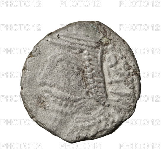 Tetradrachm of Vologases V (191–208). Obverse: bust of Vologases V wearing a tiara, facing left. Reverse: Vologases V enthroned, facing left, opposite Tyche wearing a high crown (or kalathos) offering a wreath to the ruler. Parthian Kingdom, Seleucia on the Tigris, Iran. Coin; diameter 23.0 × 24.5 mm, weight 12.85 g. Wreaths, bows (armed), heads, diadems.