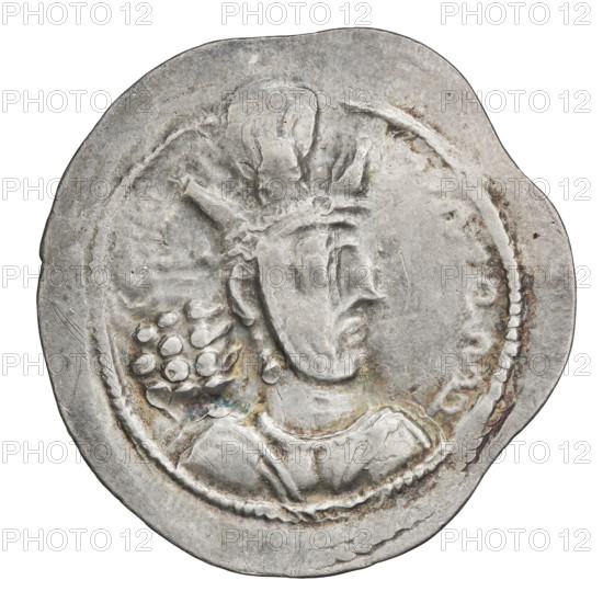 Drachma of Shapur II (ruler of Persia; 309–379). Obverse: Bust of Shapur II facing right; he wears a crown topped with a korymbos. Pahlavi inscription. Reverse: Fire altar with flames containing a male bust facing right; king and priest stand on either side facing each other, both holding swords; pearl rim. Pahlavi inscription. Sassanid art, Sassanid Kingdom; Persia, 309–379. Coin, diameter 29.5–30.0 mm, weight 4.20 g.