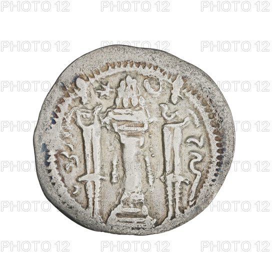 Drachma of Peroz I (ruler of Persia, 459–484). Obverse: bust of Peroz I facing right wearing a crown with wings; above it a crescent with korymbos; Pahlavi legend. Reverse: fire altar; at left the ruler stretching his hands to a star, at right a priest stretching his hands to a crescent; signs/monograms on both sides; pearl rim; Pahlavi legend. Sassanid art; Iran/Persia; motifs: wings, busts, crowns, altars, moons; material: coin. Date: 459–484. Diameter 24.0–25.0 mm; weight 3.40 g.