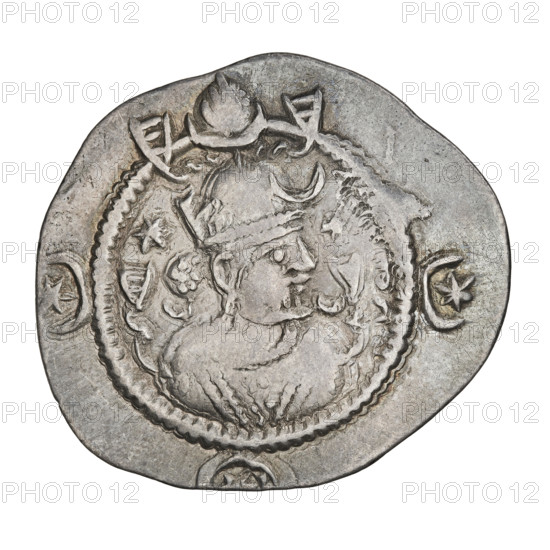 Drachma of Kavadh I (r. 488–496 and 498–531). Obverse: bust of Kavadh I facing right wearing a crown with ribbons, decorated with a crescent and korymbos; a crescent in front and two stars flanking the crown; short curly beard, curly hair tied back, one earring, beads and long chain at the neck, ribbons flowing from behind the shoulders, crescents on either side of the bust; three crescents with a central star in the field; Pahlavi legend. Reverse: fire altar; left of the altar the ruler facing forward holding a sword, right a priest facing forward holding a sword; star at top left and crescent at top right; signs/monograms at both sides; pearl rim; Pahlavi legend. Sassanid art/kingdom; Persia (Iran). Date: 488–497, 499–531. Coin diameter 26.0 × 29.0 mm; weight 4.07 g.
