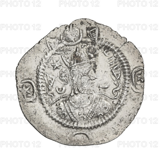 drachma, Kavadh I (ruler of Persia; 488–496 and 498–531). Obverse: bust of Kavadh I facing right; wearing a crown with ribbons and a crescent with korymbos on the crown, a crescent in front of the crown, stars on both sides of the crown; short curly beard, curly hair tied back, earring, beads and long chain around the neck, ribbons flowing from behind the shoulders, crescents on both sides of the bust; outside the rim three crescents with a star in the center; Pahlavi legend. Reverse: fire altar; to its left the ruler stands facing forward with a sword in his hand; to the right a priest stands facing forward holding a sword; a star at top left, a crescent at top right, signs/monograms on both sides; pearl rim; Pahlavi legend. Sassanid art; Sassanid Kingdom; Iran/Persia; korymbos. Date: 488–497, 499–531. Coin: diameter 28.0 mm; weight 4.09 g.