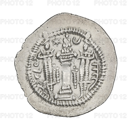Drachma of Kavadh I (ruler of Persia; 488–496 and 498–531). Obverse: bust of Kavadh I facing right; wearing a crown with ribbons and a crescent with korymbos on the crown, a crescent in front of the crown, stars on both sides of the crown; short curly beard, curly hair tied back, earring, beads and long chain around the neck, ribbons flowing from behind the shoulders, crescents on both sides of the bust; outside the rim three crescents with a star in the center. Pahlavi legend. Reverse: fire altar; to its left the ruler stands facing forward with a sword in his hand, to the right a priest stands facing forward holding a sword; star at top left, crescent at top right, signs/monograms on both sides; pearl rim. Dates: 488–497, 499–531. Persia (Sassanid), Sassanid art. Coin: diameter 28.0 mm, weight 4.09 g.