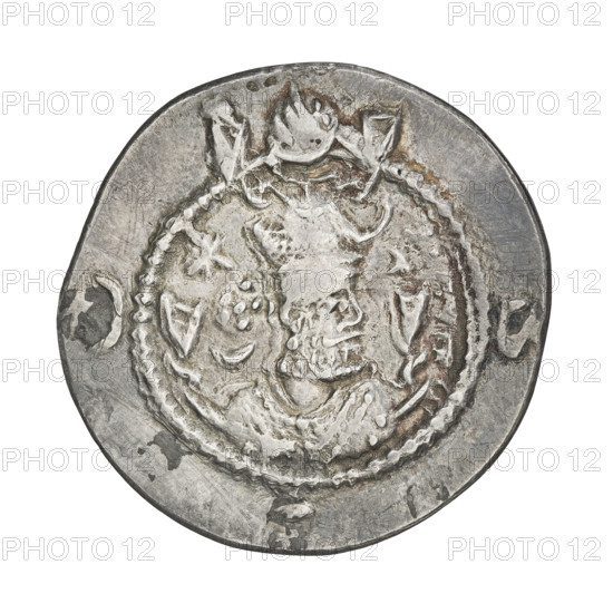 Drachma of Kavadh I (r. 488–496 and 498–531). Obverse: bust of Kavadh I facing right wearing a crowned head-dress with ribbons; crown topped by a crescent with a korymbos, an additional crescent in front, stars flanking the crown; short curly beard, curly hair tied back, earring, beads and long chain around the neck, ribbons flowing from behind the shoulders, crescents on both sides of the bust; outside the rim three crescents with a central star; Pahlavi legend. Reverse: fire altar; to the left the ruler stands facing forward holding a sword, to the right a priest stands facing forward holding a sword; star at top left and crescent at top right, signs/monograms on both sides; pearl rim; Pahlavi legend. Sassanid art; Sassanid Kingdom, Persia (Iran). Date: 488–497, 499–531. Coin: diameter 27.0 mm, weight 3.55 g.