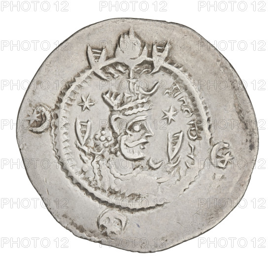 Drachma of Kavadh I (r. 488–496 and 498–531). Obverse: bust of Kavadh I facing right wearing a crown with a crescent and korymbos, a crescent on the front of his helmet, stars on both sides; short curly beard, curly hair tied back, earring, beads and long chain at his neck, ribbons flowing from behind his shoulders; crescents on both sides of the bust; outside the rim three crescents with a star in the center; Pahlavi legend. Reverse: fire altar; left of altar the ruler stands facing forward holding a barsomere, right of altar a priest stands facing forward holding a barsomere; star at top left, crescent at top right, signs/monograms on both sides; pearl rim; Pahlavi legend. Sassanid art; Persia (Iran); dated 488–497, 499–531. Coin: diameter 26.0 × 29.0 mm, weight 3.05 g.