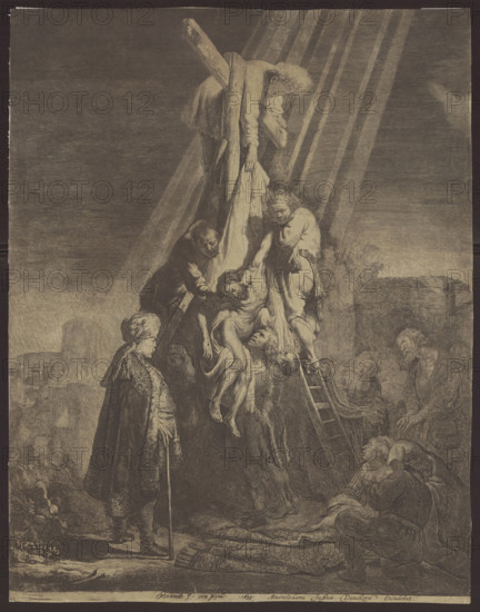 Descent from the Cross, Rembrandt van Rijn (1606–1669), graphic artist; Jan Georg van Vliet (ca. 1610–1668), graphic artist; religious scenes, Passion; Jesus Christ, descent from the cross; saints; 1633; graphic print; height 53.2 cm, width 41.3 cm, A monochrome scene with sepia and brown tones showing a group of people gathered around a large wooden cross. A few men on a ladder and at the base of the cross are lowering a limp figure wrapped in cloth while others support and guide the body. A man wearing a long cloak and a turban-like head covering stands to the side holding a staff and watching. Several onlookers kneel or stand nearby, some with hands raised toward the central figures. Rays of light fall diagonally from the upper right toward the cross and figures, creating areas of brighter beige against darker brown surroundings. In the background there are indistinct architectural shapes and a low wall, and the ground in the foreground appears textured with drapery and uneven earth...