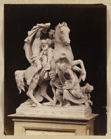Photograph of Wiktor Brodzki's sculpture 'Escape from Pompeii' (Pompeii Fugue). View from the side with the inscription 'FUGA'; sculptor: Wiktor Brodzki (1817/1826/1828–1904); publisher: Suscipj, Lorenzo (Rome; photographic studio; 183–1901). Subjects: escapes, horses, women, men, children. Date: ca. 1868, Rome. Photograph, photographic print; height 31 cm, width 24.3 cm.