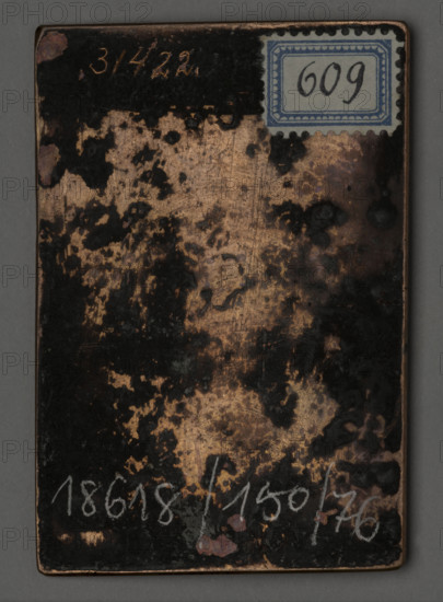 S. Apolonia (Saint Apolonia). Czerski, Stanislaw (1777–1833), draughtsman. Apolonia (Saint; ?–249), devotional depiction, saints. Engraving, 1822–1832. Graphic plate (graphic matrix). Height 7.5 cm; width 5.1 cm. WQXBCFS
I:\nmw crop ready cleaned\ WQXBCFS
I:\nmw crop ready cleaned\The image depicts Saint Apolonia in bust, holding tongs with an extracted tooth; flames appear to her right. Composition within an oval inside a double linear frame, the whole set inside a rectangular linear border along the plate edge. The engraving was made by Father Stanislaw Czerski in Salanty in Samogitia. As a parish priest, with the help of a young assistant he adopted, he engraved images of saints with Samogitian inscriptions for his parishioners who did not know other languages.