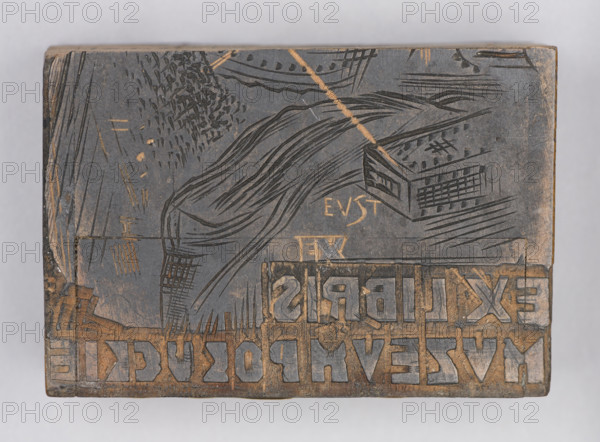 Józef Starzynski bookplate; verso: fragment of another crossed-out bookplate cut into two parts reading EX LIBRIS, MVZEVM POKUCKIE, negatively engraved by Ludwik Tyrowicz, 1940, Lviv. Graphic woodcut block; height 6 cm, width 4.1 cm, thickness 2.2 cm. Subjects/styles: bookplate, graphic matrix, woodcut block, illustrative bookplate with figures; makers: Ignacy Lopienski (1865–1941), Ludwik Tyrowicz (1901–1958), Józef Starzynski (1890–1961).