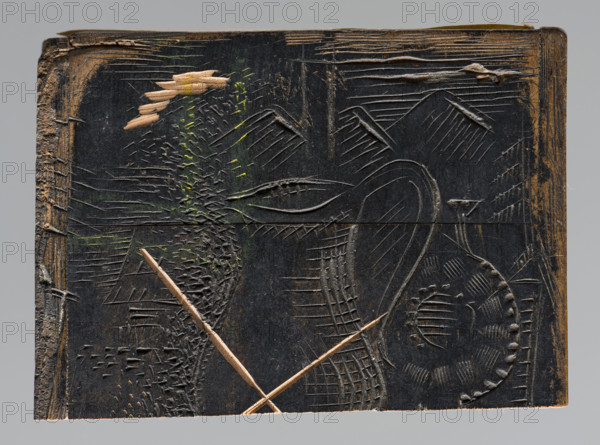 Bookplate of Zygmunt Grünstein; verso: fragment of another bookplate crossed out and cut into two parts; Ignacy Lopienski (1865–1941), graphic artist; Ludwik Tyrowicz (1901–1958), graphic artist; motifs: snakes (zool.), Aesculapian snake (mythological), chalices, jugs; inscription EX LIBRIS, MVZEVM POKUCKIE negatively engraved by Ludwik Tyrowicz, 1940, Lviv; bookplate, graphic matrix, woodcut block; dimensions: height 6.0 cm, width 4.2 cm, thickness 2.2 cm.