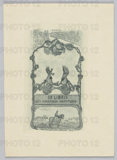 Ex libris bookplate for Kaeta (Kaety) Schulthess-Kauffmann, 1909. Graphic print (Lucerne), height 9.6 cm, width 5.8 cm. Heraldic-symbolic composition: at the top a view of Zurich with towers and cityscape; in the middle two coats of arms with heraldic helmets and heraldic animals; below a horsewoman (amazon) on horseback. Style: Swiss graphics; motifs include marriage bookplate/heraldry, plant ornaments (roses), landscapes/rural buildings and fields. Maker: Jean Kauffmann (1866–1924).