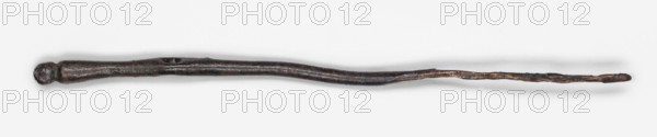 Clothes pin, Northern Mesopotamian workshop, pins for fastening garments, material culture, Short pin with a straight shaft of circular cross-section. In the upper part there is a conical extension terminating in a small round head, separated by a notch. Below the head, at 1/4 length, there is a slight flattening on the shaft, which contains a hole for passing a string through. 1st half of the 3rd millennium BC; Early Jazira III period (Early Dynastic III; c. 2600–c. 2350 BC), Tell Jassa el Gharbi (northeastern Syria), Northern Mesopotamia (Khabur basin), pin (clasp). Total: length 10.76 cm; diameter 0.1 cm (minimum) — 0.4 cm (maximum); middle part: width 0.45 cm (flattened part), thickness 0.25 cm (flattened part); diameter 0.2 cm (hole).