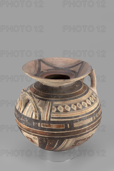 Stamnos, geometric motifs, Southern Italic pottery. Globular vessel with a small flattened bottom and a widely flared high rim. In the upper part of the belly, flat vertically positioned vices. 6th century BC (dating before the 2019 revision: 550–500 BC). Daunia. Vessel (stamnos). Weight 3.322 kg.