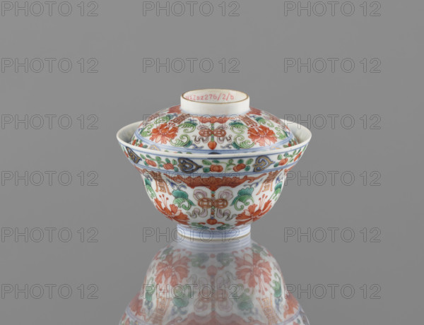 Bowl with lid; Chinese colored porcelain; Qing dynasty, Qianlong period (1736–1795); decorated with bats, longevity shou, lotus tendrils, lotuses, and peaches; vessel; height 9 cm, diameter 10.7 cm; China; 1736–1795.