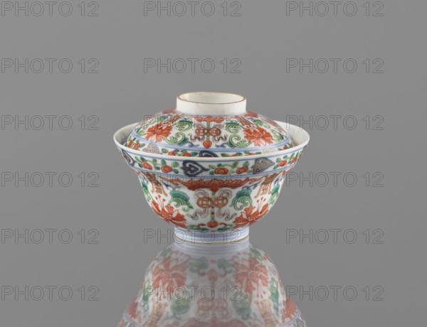 Bowl with a lid; Chinese colored porcelain; Qing dynasty (Qianlong period/style), 1736–1795; decorated with bats, longevity shou, lotus tendril ornament, lotuses, and peaches; vessel; height 9 cm, diameter 10.7 cm; maker: unknown; date range 1736–1795.