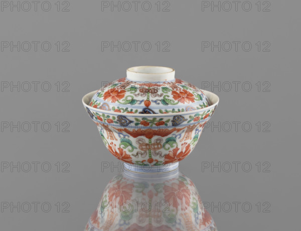 Bowl with lid; Chinese colored porcelain; Qing dynasty, Qianlong period (1736–1795); decorated with bats, longevity shou, lotus tendril ornament, lotuses, and peaches; vessel; height 9 cm, diameter 10.7 cm; dated 1736–1795.