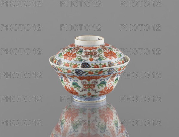 Bowl with a lid; Chinese colored porcelain; Qing dynasty, Qianlong period/style (1736–1795); decorated with bats, longevity shou, lotus tendril ornament, lotuses, and peaches; vessel; height 9 cm, diameter 10.7 cm; China; 1736–1795.