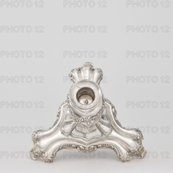 Etazera by Józef Fraget (Warsaw; silver and plated goods factory; 1824–1945). Three-tiered platter on a three-sided base with three knobbed plates, plated with gold on the outside and silver on the bottom, with silver-plated tin overlays on the edges. Finished with an oval decorative handle. Composed of two parts: the base and a plate holder inserted into a cylindrical opening. Marked with an oval Fraget mark with the date 1843. Vessel, 1843, Poland, Warsaw; height 57 cm, width 25.9 cm.