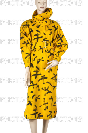 Women's dress with turtleneck and belt, yellow with black 'Japanese characters', manufactured by Spóldzielnia Pracy Dom Pracy (Warsaw; fl. ca 1980–1985); designer Hoff, Barbara (1932– ); Hoffland (youth clothing brand); women's fashion, PRL, mass-produced dress, 1985, Warsaw.