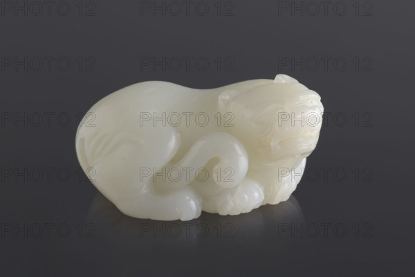 Tiger — paperweight. Maker: Rubiec-Masalski, Fyodor Vasilyevich (1865–1920?), Tulisov, Jerzy (1943– ). Subject/materials/style: Chinese art; Chinese; Qing (1644–1911); Qing (style). Function: writing instrument, paperweight for scholars and officials. Subject: tiger (zool.). Date: 18th–19th century. Place: China. Object type: sculpture. Dimensions: height 6.3 cm; width 3.4 cm.