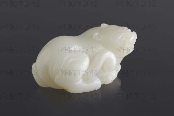 Tiger — paperweight; maker: Fyodor Vasilyevich Rubiec-Masalski (1865–1920?); Tulisov, Jerzy (1943– ); subject: tiger; material/genre: sculpture, paperweight; cultural/style: Chinese art, Chinese, Qing (1644–1911), Qing (style); function: writing instrument, scholars/officials' paperweight; subject category: tigers (zool.); date: 18th–19th century; place: China; dimensions: height 6.3 cm, width 3.4 cm.