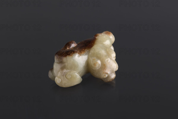 Lion paperweight; carved stone; artist: Fyodor Vasilyevich Rubiec-Masalski (1865–1920?); Chinese; Tulisov, George (1943– ) [remove if considered owner?]. Qing (1644–1911); Qing (style); 18th–19th century; subject: lions, scholars, officials, writing instruments; sculpture; height 6.0 cm, width 3.4 cm.