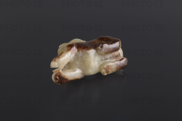 Lion paperweight; maker: Fyodor Vasilyevich Rubiec-Masalski (1865–1920?); material: paperweight; subject: lion; cultural/artist references: Chinese art, Chinese; associated person: George Tulisov (1943– ); period/style: Qing (1644–1911), Qing (style); themes: lions, scholars, writing instruments, officials; date: 18th–19th century, China; type: sculpture; dimensions: height 6.0 cm, width 3.4 cm.
