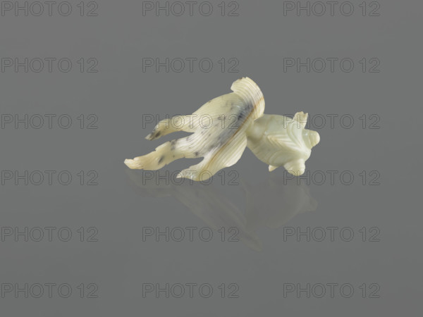 Fish-shaped paperweight; fish motif; Chinese; Qing dynasty (1644–1911); 19th century; decoration; height 3.5 cm; width 11.0 cm; depth 6.5 cm. WQXBCFS