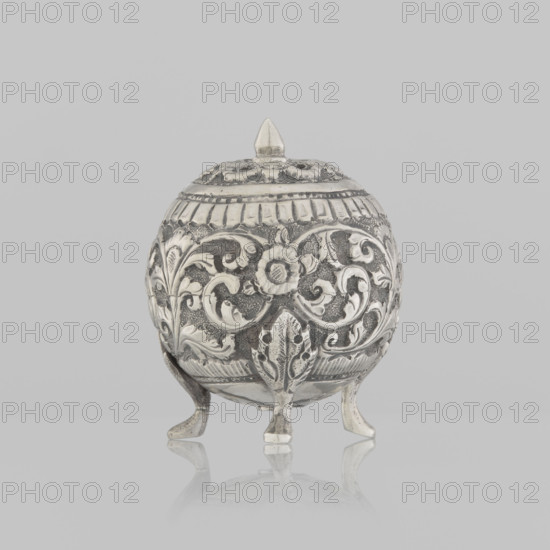 Salt cellar; Indian; 19th century. Small vessel (height 5.0 cm, diameter 4.0 cm) with plant tendril and floral motifs; used for salt and spices.